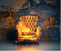 Image of chair on fire